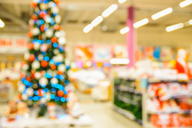 Abstract Blurred shopping mall background with Christmas decorations stock photo