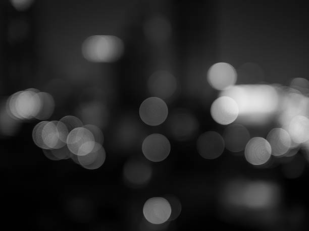Abstract bokeh background (black and white shot) stock photo