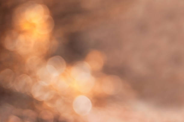 Abstract bokeh blur background with golden autum colors stock photo