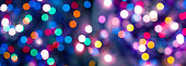 istock Abstract colorful shiny bokeh in Christmas night 1285964116