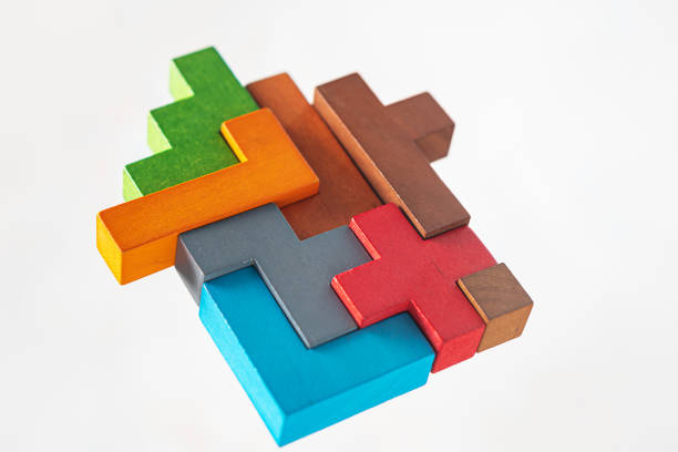 Abstract construction from wooden blocks. The concept of logical thinking. stock photo