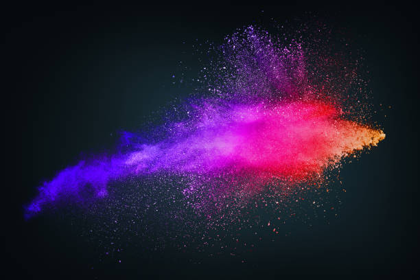 Abstract design of bright colored powder cloud on dark background Abstract design of bright colored powder or dust particles cloud explosion and splash with smoke flying over black background colored powder stock pictures, royalty-free photos & images