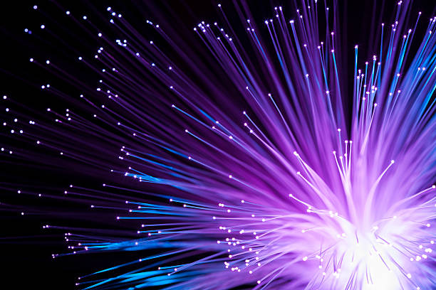 Abstract fiber optics colorful shiny fiber optics. fiber stock pictures, royalty-free photos & images