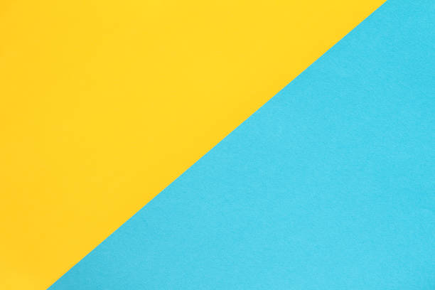 Abstract geometric colorblock background in bright yellow and blue colors. stock photo