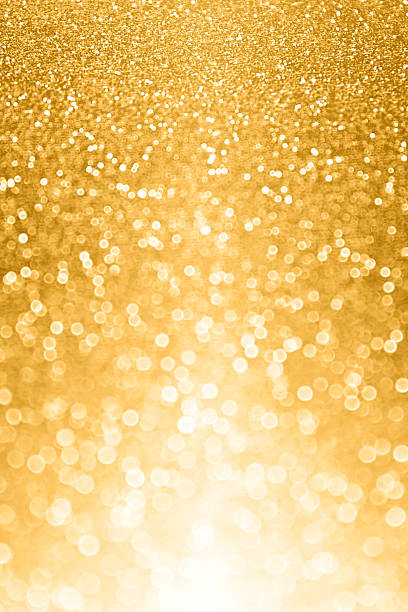 Abstract gold glitter sparkle luxury background stock photo