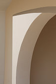 istock abstract lines of arches. art and design concept. shadow texture. space for text. Light and shadow on gray wall. 1332083377