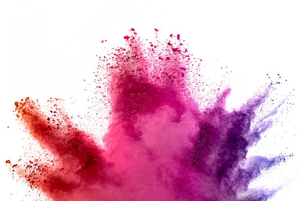 Abstract multicolored powder splash on white background.Freeze motion of color powder exploding. Abstract multicolored powder splash on white background.Freeze motion of color powder exploding. holi photos stock pictures, royalty-free photos & images