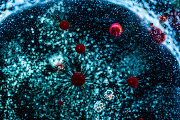 patrón abstracto. textura para diseño gráfico realizada con agua, aceite y tintes. cifras como virus y células. coronavirus, gripe y varios virus. - covid variant fotografías e imágenes de stock