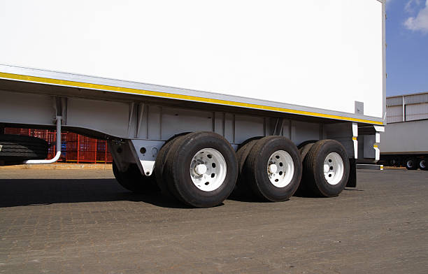 Abstract photograph of a truck trailer and wheels stock photo