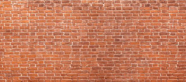 Abstract red brick wall panoramic background stock photo
