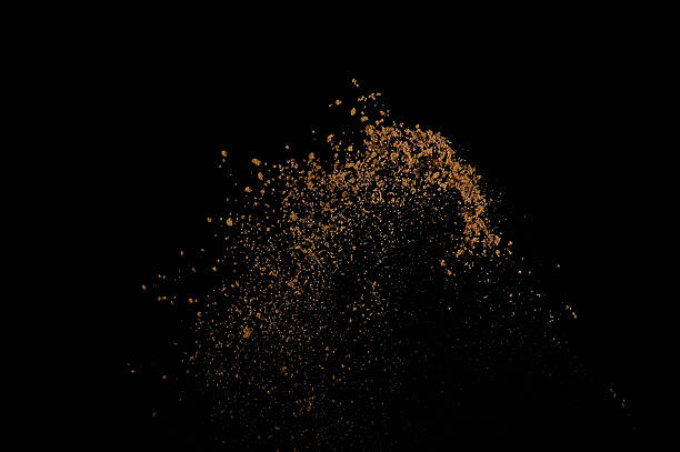 Abstract soil explosion. Soil explosion isolated on black background. Abstract cloud of brown ground. mud stock pictures, royalty-free photos & images