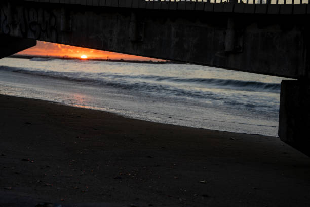 Abstract Sunrise under Boardwalk stock photo