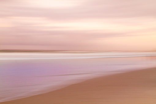 Abstract sunset sky and ocean background with blurred motion