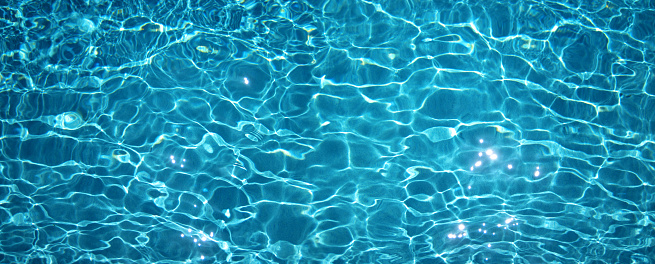 Close up water surface from swimming pool.