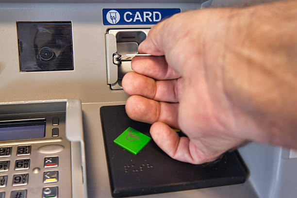Accessing the ATM stock photo