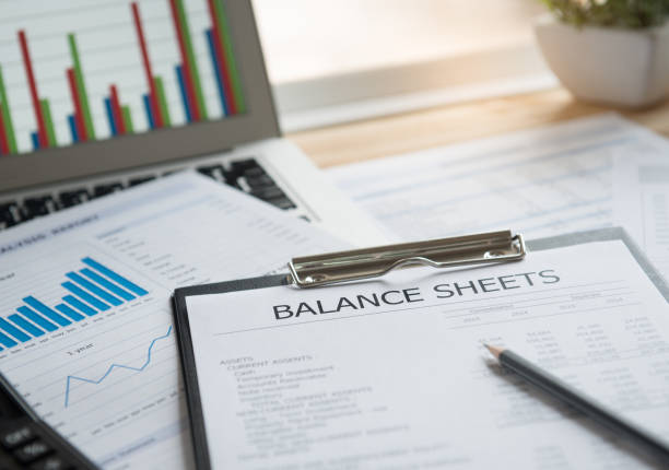 accounting reporting accounting concept. balance sheet and business earning report on desk. bank statement stock pictures, royalty-free photos & images