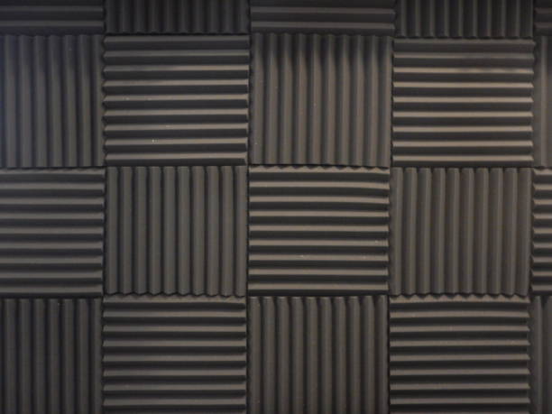 Acoustical foam or tiles for sound dampening. Music room. Soundproof room. Low key photo. Acoustical foam or tiles for sound dampening. Music room. Soundproof room. Low key photo. soundproof stock pictures, royalty-free photos & images