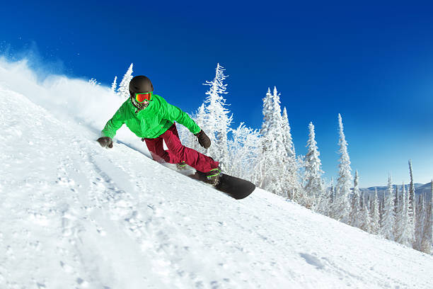 active snowboarder snowboarding rides closeup - kemerovo imagens e fotografias de stock