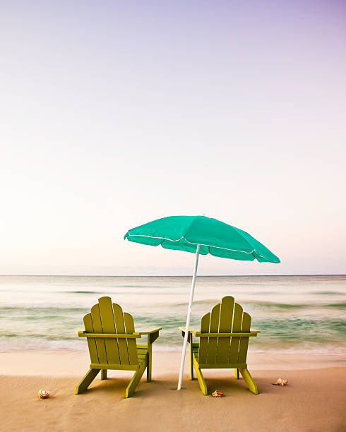 Best Two Chairs Beach Sunset Stock Photos, Pictures & Royalty-Free ...