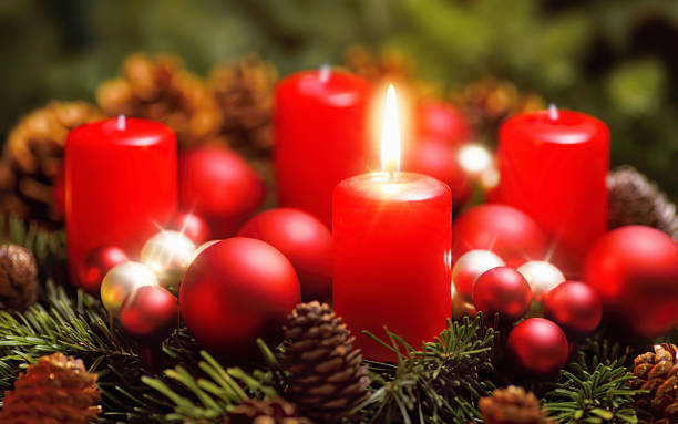 Advent wreath with one burning candle stock photo