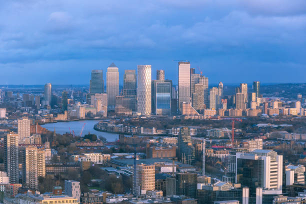 Aerial cityscape of River Thames with Canary Wharf in the background stock photo