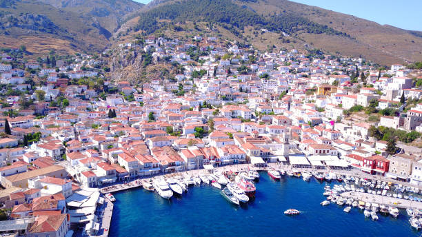 Aerial drone photo from picturesque island of Hydra on a spring morning, Saronic Gulf, Greece stock photo