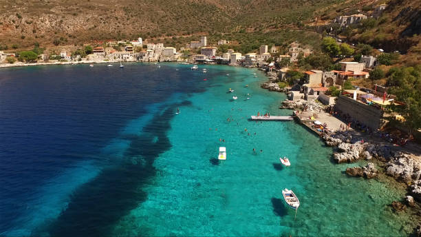 Aerial drone photo of picturesque village of Limeni in Mani area with clear waters, Peloponnese, Lakonia, Greece stock photo