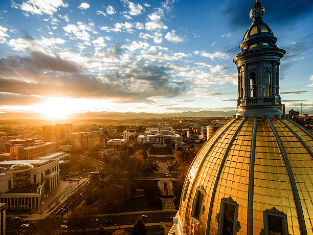 Aerial drone sunset photo.  Colorado capital building, city of Denver beautiful drone image of the golden cupola of the Colorado state capital building in the city of Denver capital cities stock pictures, royalty-free photos & images