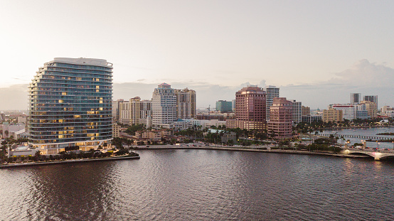 Aerial Footage of Downtown West Palm Beach, Florida Inlet Waterfront at Sunset in February of 2021.