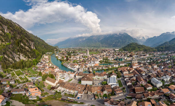 Aerial panorama of the famous Interlaken old town at the foot of the Jungfrau region in the alps in Canton Bern in Switzerland stock photo