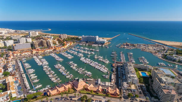 Aerial photo of the bay, Vilamoura, Quarteira, Portugal. Marina with luxury yachts. stock photo