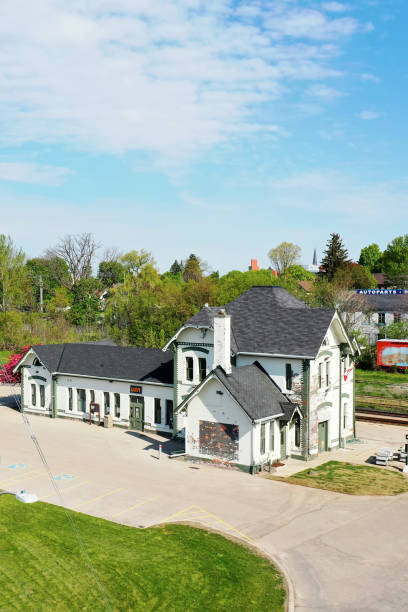 Aerial vertical of an old train station in Woodstock, Ontario, Canada An aerial vertical of an old train station in Woodstock, Ontario, Canada. Built in 1885 for the CNR, it is used by ViaRail and has a Historic Designation. woodstock ontario stock pictures, royalty-free photos & images