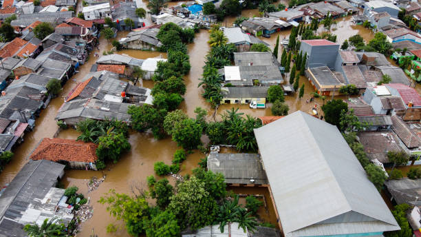 Aerial POV view Depiction of flooding. devastation wrought after massive natural disasters stock photo