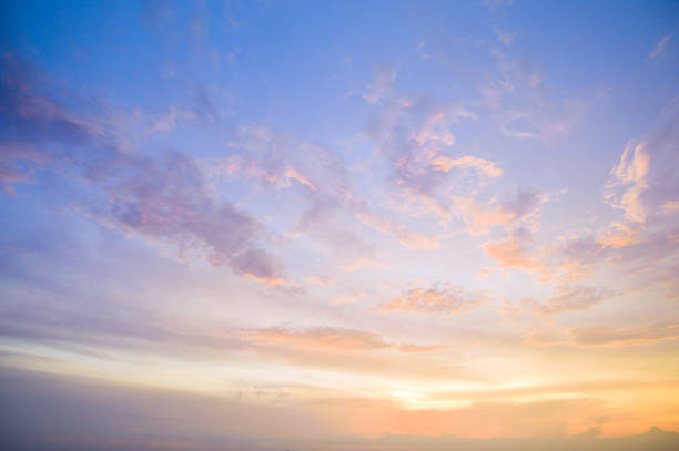 aerial view dramatic sunset and sunrise sky nature background with white clouds - céu fenómeno natural imagens e fotografias de stock