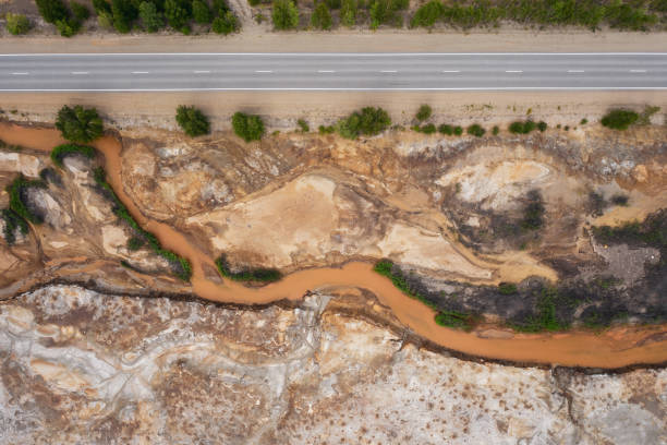 Aerial view; drone moving over the very polluted river, Karabash stock photo