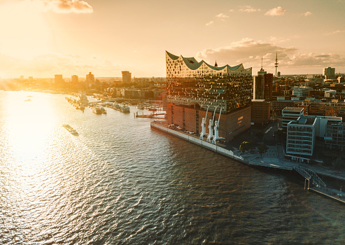 aerial view from waterside on Hamburg Hafen City at sunset hour