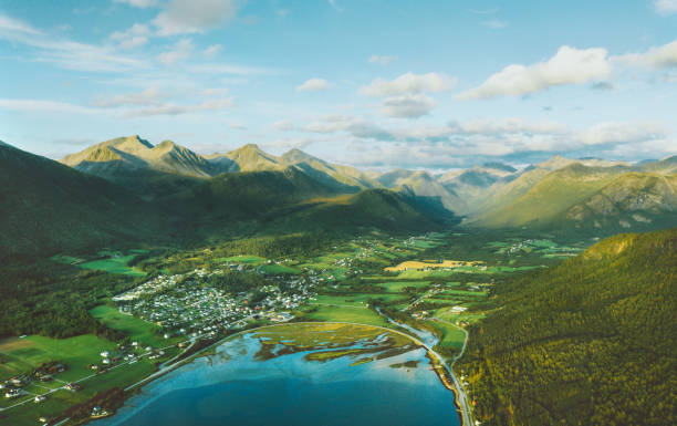 Aerial view mountains valley and city landscape in Norway travel destinations nature Andalsnes Romsdal scenery stock photo