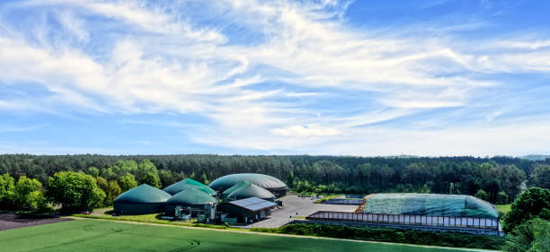 Aerial view of a biogas plant for the production of electrical energy from organic waste and agricultural residues stock photo