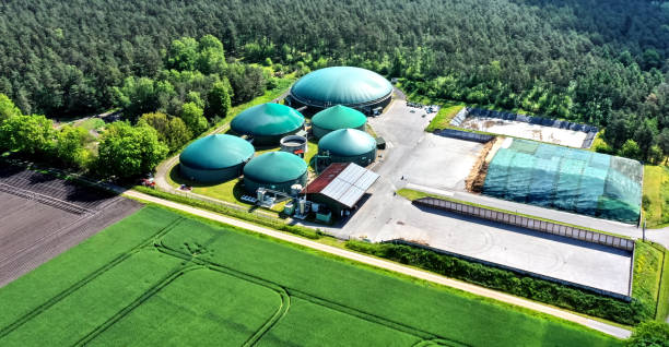 Aerial view of a biogas plant for the production of electrical energy from organic waste and agricultural residues stock photo