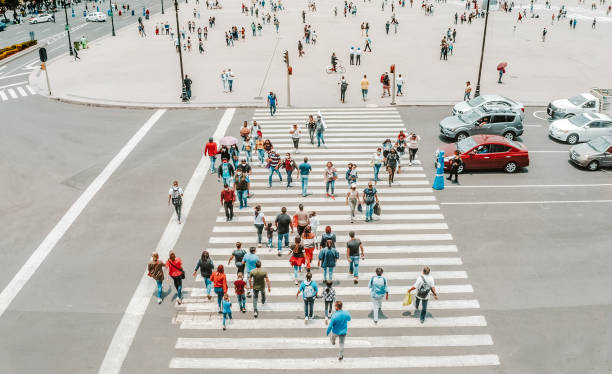 Aerial view of a crowd crossing the street stock photo