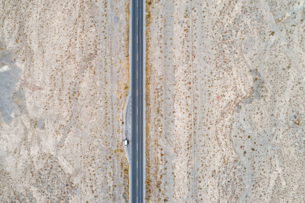 veduta aerea di una strada desertica nel nord-ovest della cina - gobi desert foto e immagini stock