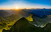 istock Aerial view of a sunrise in the mountains 1285344693