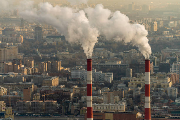 Aerial view of a working thermal power plant in a big city in the winter. stock photo