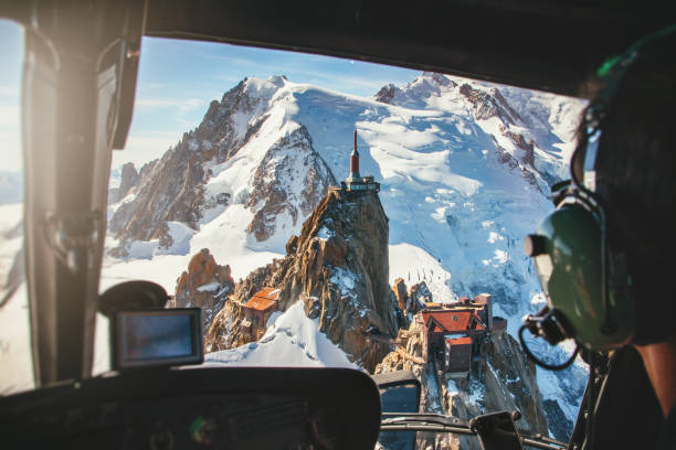 aerial view of aiguille du midi from mont blanc massif in french alps mountains view from helicopter cockpit - mont blanc imagens e fotografias de stock
