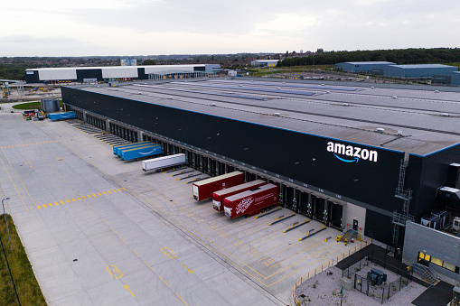 Leeds, UK - August 13, 2021.  Aerial view of the Amazon warehouse and fulfillment centre in Leeds, West Yorkshire.