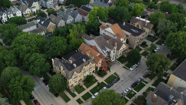 Aerial view of american neighborhood, houses nearby downtown Milwaukee, Wisconsin. Cloudy morning, summertime. Aerial view of american neighborhood, houses nearby downtown Milwaukee, Wisconsin. Cloudy morning, summertime. milwaukee shooting stock pictures, royalty-free photos & images