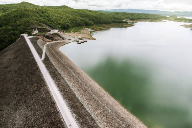 Aerial view of an embankment dam. stock photo