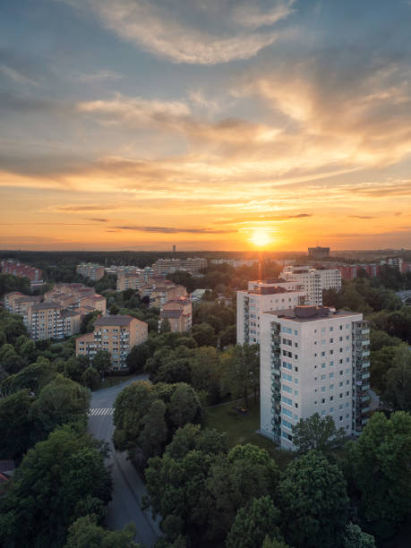 Aerial view of apartment buildings at sunset stock photo