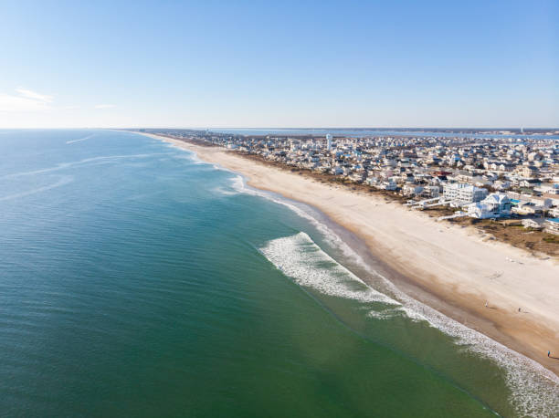 Aerial View of Atlantic Beach, North Carolina Aerial view of beautiful water and shoreline of Atlantic Beach, North Carolina, on a sunny winter day. north carolina beach stock pictures, royalty-free photos & images