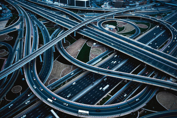 Aerial view of big highway interchange with traffic in Dubai, UAE, at day stock photo